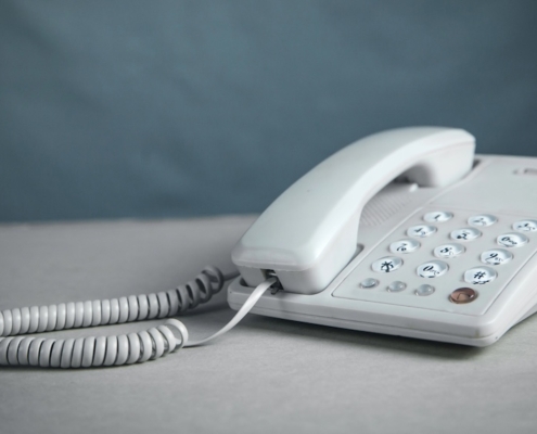 Office worker using phone ahead of analog trunk replacement project