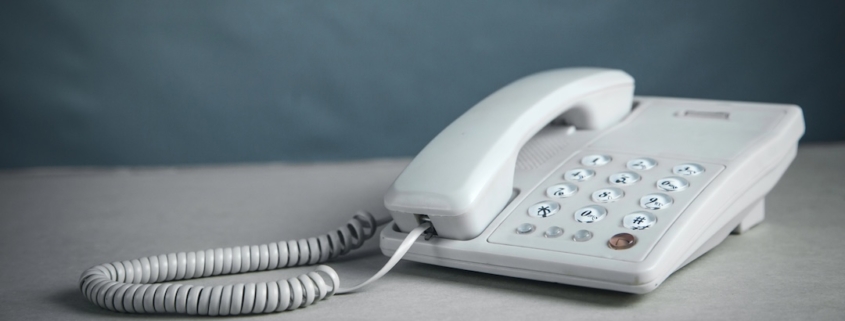 Office worker using phone ahead of analog trunk replacement project