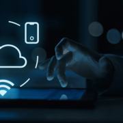 cloud based business communication technology.jpg Cloud, mobile, internet, and Wi-Fi icons displayed above a tablet