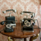 Collection of antique telephones showing the history of business communication