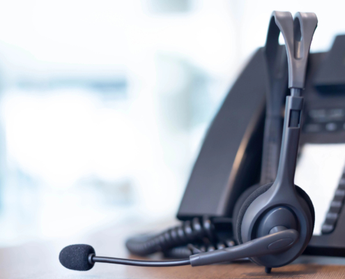 Growing business team using Mitel scalable communication platform to support expansion from small to midmarket